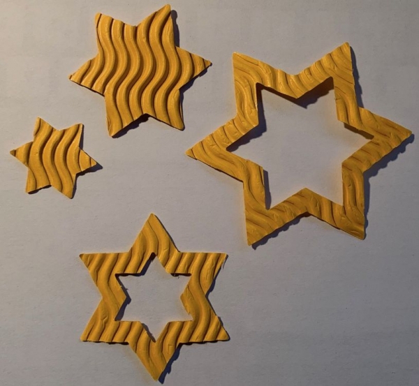 Sterne / Sternli aus Wellen-Wellpappe / Wellkarton gelb
